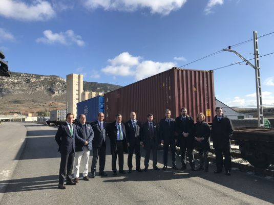 Delegates of the Port of Bilbao and other authorities beside the train